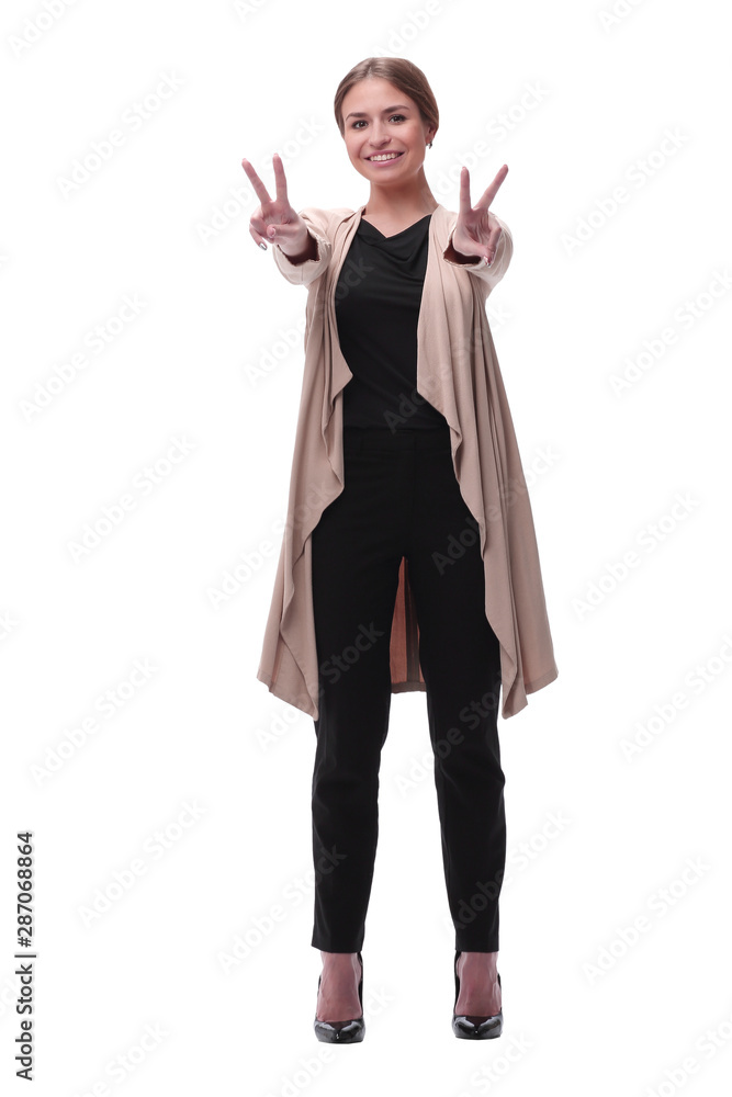 young woman showing victory gesture . isolated on white young woman showing victory gesture . isolated on white