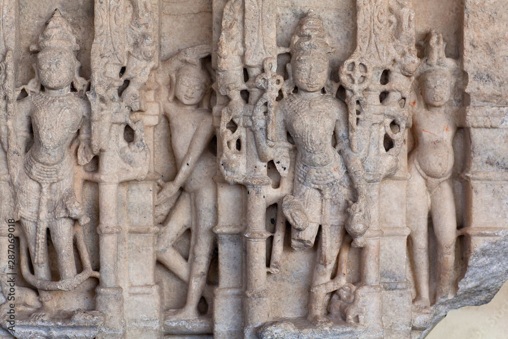 Bas-relief with Varuna and Vayu gods in famous ancient Shree Eklingnath Ji hindu temple in Udaipur, Rajasthan, India