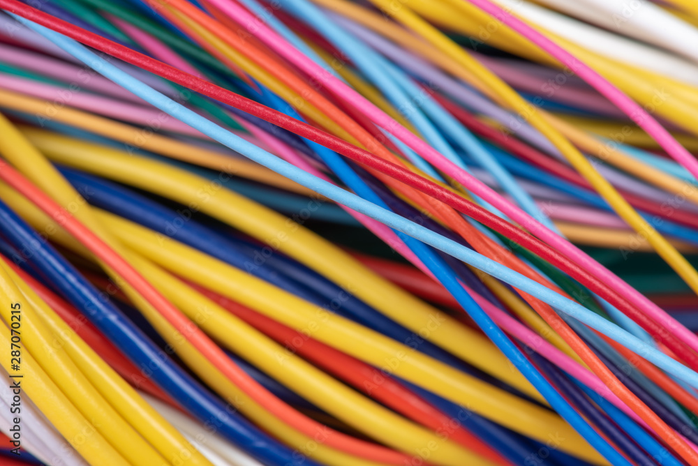 Group of colorful electrical cables closeup