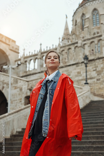 Young woman with blonde hair in the Fisherman's Bastion in the Castle district of Budapest