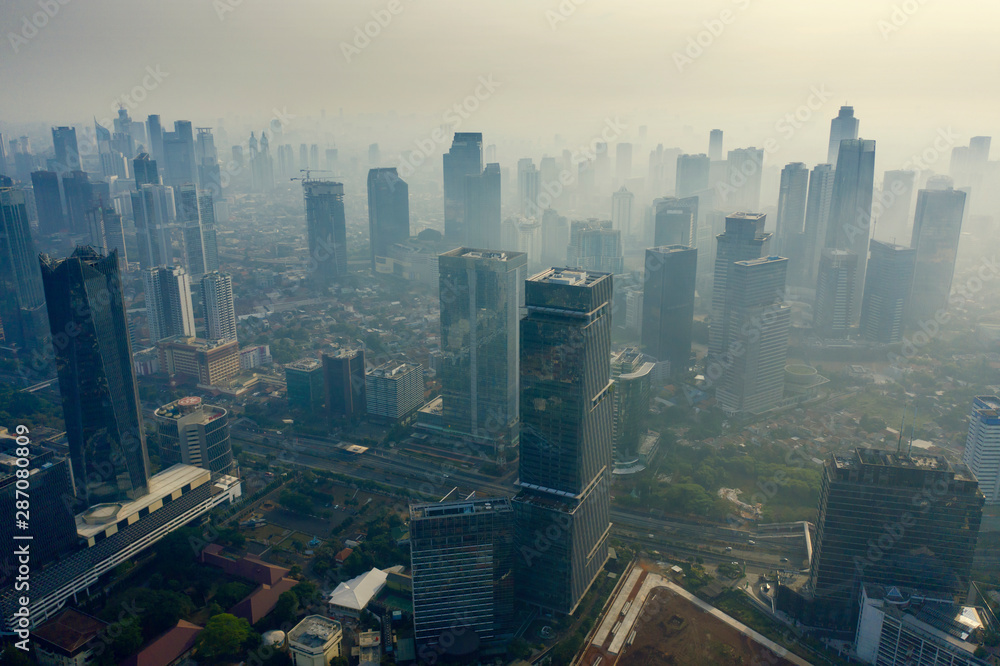 Foggy Jakarta cityscape at morning time
