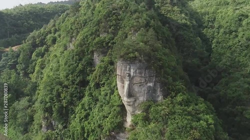 A Mountain Buddha In Dashan, Guizhou, Has A 4m Higher Head Than Leshan Buddha (aerial photography) photo
