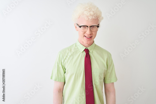 Young albino businessman wearing shirt and tie standing over isolated white background with a happy and cool smile on face. Lucky person.