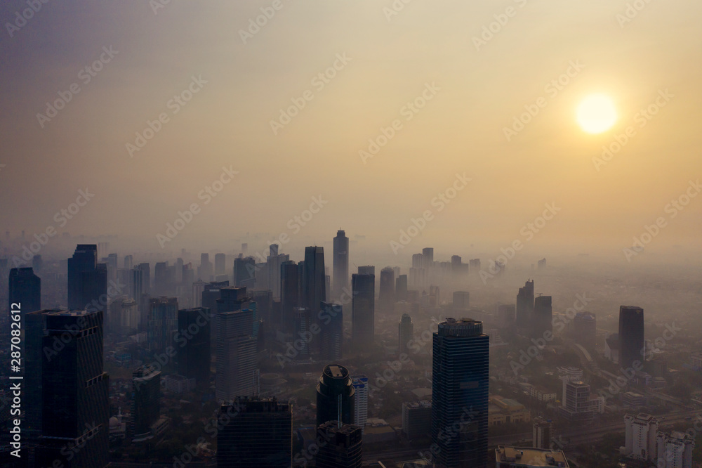 Jakarta city with air polluted at dusk time