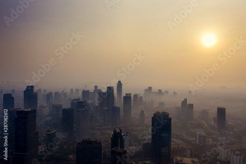 Jakarta city with air polluted at dusk time © Creativa Images
