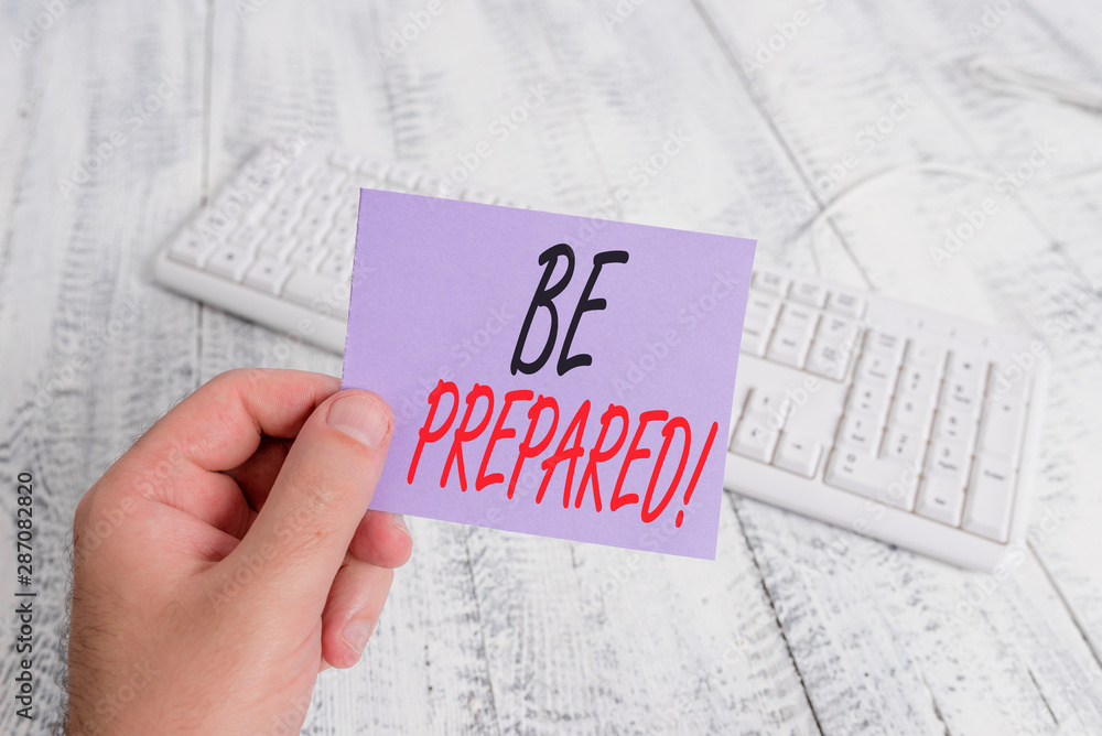 Text sign showing Be Prepared. Business photo showcasing try be always ready to do or deal with something man holding colorful reminder square shaped paper white keyboard wood floor Text sign showing Be Prepared. Business photo showcasing try be always ready to do or deal with something man holding colorful reminder square shaped paper white keyboard wood floor