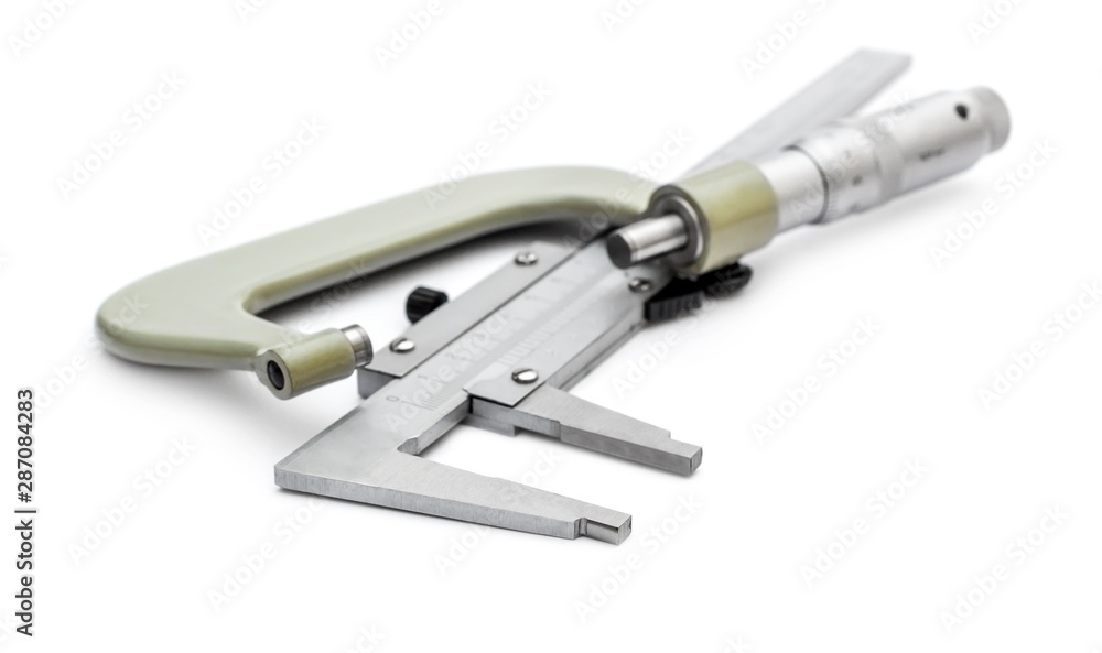 Micrometer with vernier calliper on white. Micrometer with vernier calliper on white.