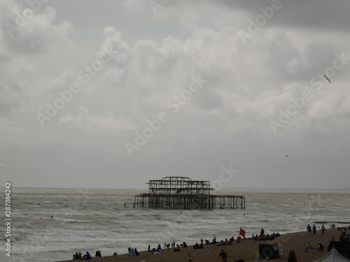 Old Brighton Pier Remants out to sea on a Stormy Day photo