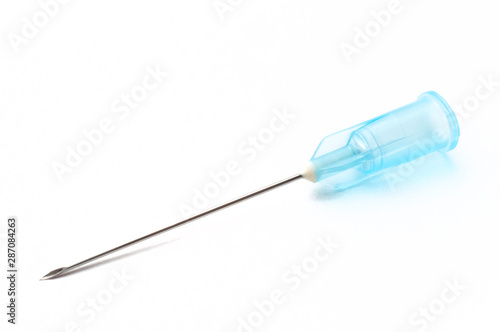 An hypodermic needle on white background. It is used with a siringe to inject substances in the body.
