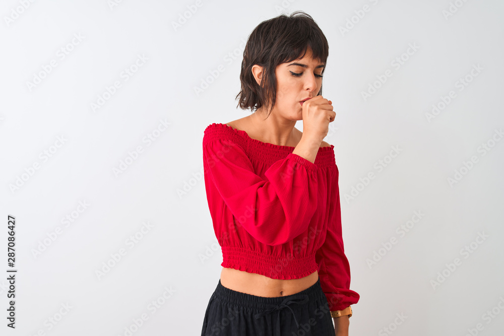 Young beautiful woman wearing red summer t-shirt standing over isolated white background feeling unwell and coughing as symptom for cold or bronchitis. Healthcare concept. Young beautiful woman wearing red summer t-shirt standing over isolated white background feeling unwell and coughing as symptom for cold or bronchitis. Healthcare concept.