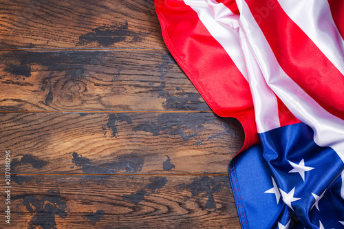 American flag on wooden background photo