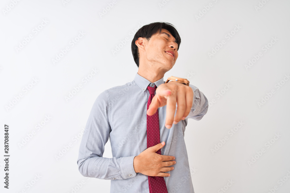 Chinese businessman wearing elegant tie standing over isolated white background laughing at you, pointing finger to the camera with hand over body, shame expression Chinese businessman wearing elegant tie standing over isolated white background laughing at you, pointing finger to the camera with hand over body, shame expression