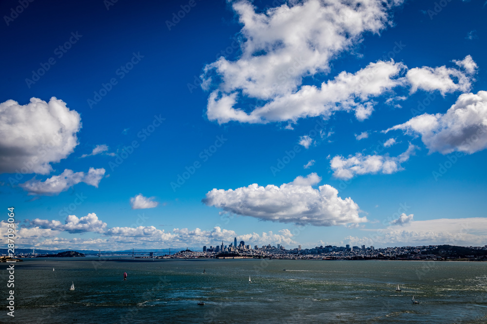 San francisco skyline with lots of blue sky and a few clouds on a clear sunny day San francisco skyline with lots of blue sky and a few clouds on a clear sunny day