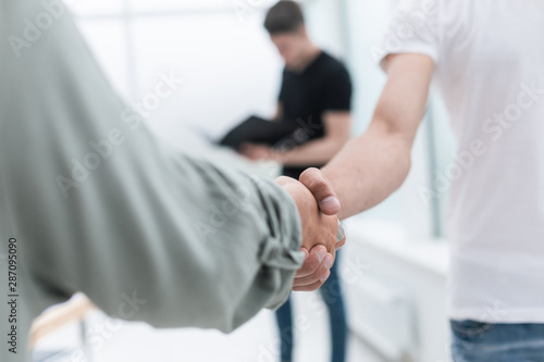 close up. business handshake in an office background