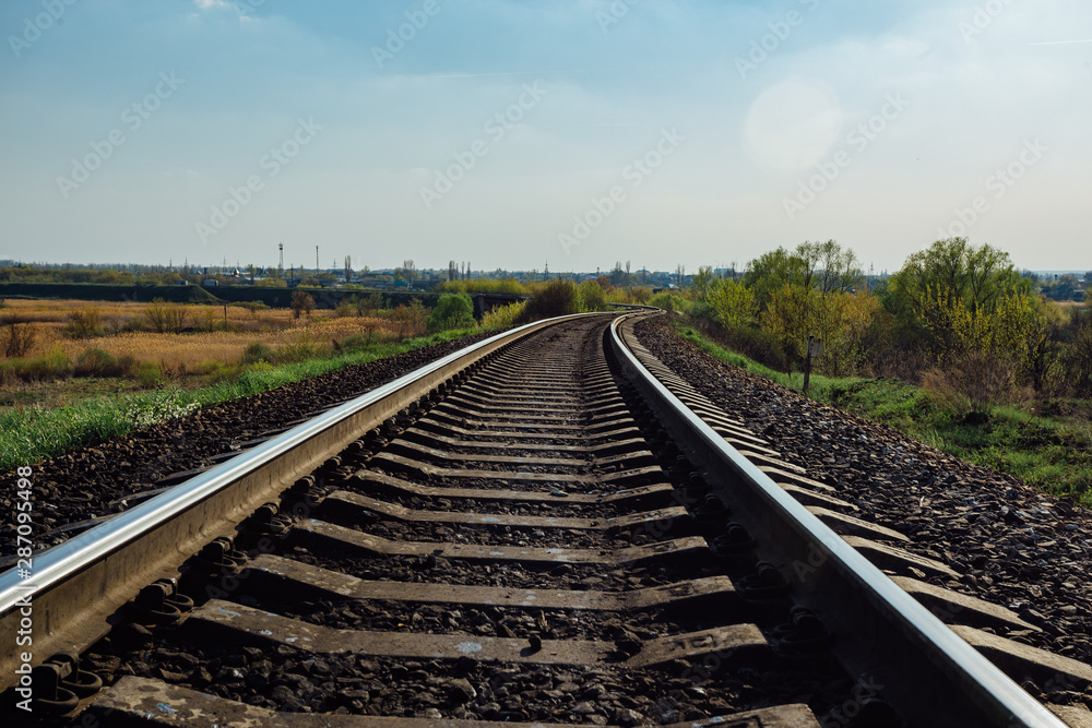 Empty railway track in sunny summer day Empty railway track in sunny summer day