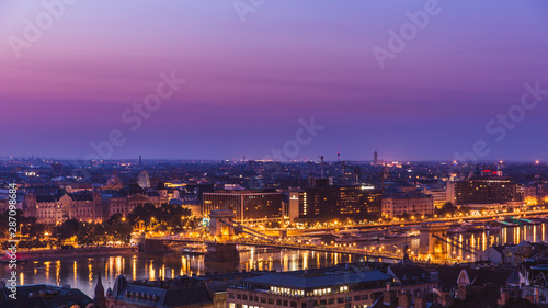 Fototapeta Naklejka Na Ścianę i Meble -  Panoramic cityscape of Chain Bridge on the Danube river. Colorful sunrise in Budapest, Hungary