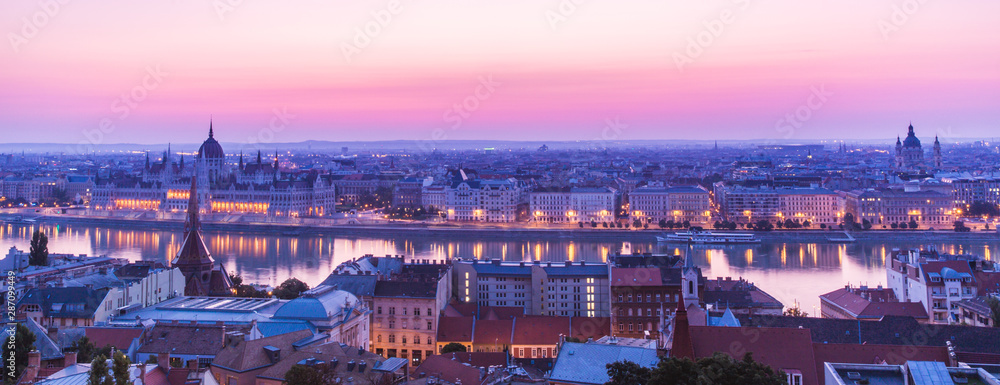 Panoramic cityscape of Hungarian parliament building Saint Stephen basilica on the Danube river. Colorful sunrise in Budapest, Hungary