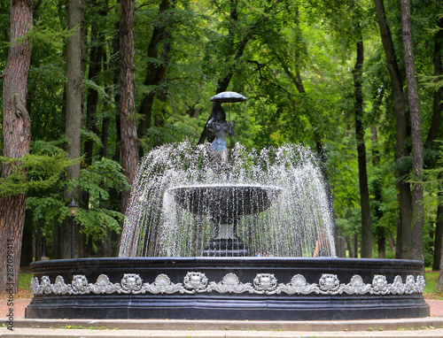 Fountain in Kaluga and sculpture Yoke with an umbrella or the story of bathers