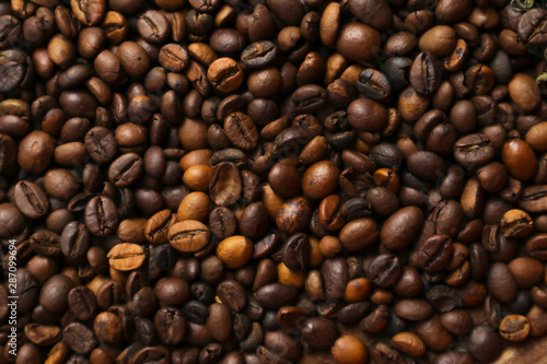 Roasted coffee grains as background  close up