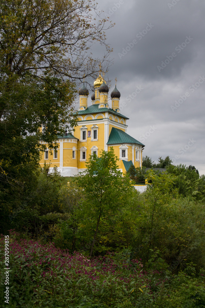  yellow Nikolo-embankment temple on a cloudy summer day in Murom Russia