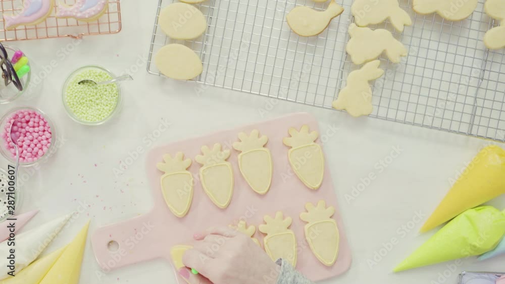 Step by step. Flat lay. Decorating Easter sugar cookies with royal icing. Step by step. Flat lay. Decorating Easter sugar cookies with royal icing.