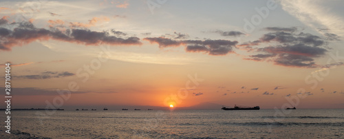 Sunset over the beach at Cape Fatucama in Dili, East Timor. photo