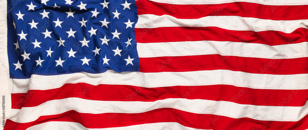 Obraz premium US American flag background or Patriotic USA red, white, and blue wallpaper. For 4th of July, Memorial day, Labor day, or Veteran's day.