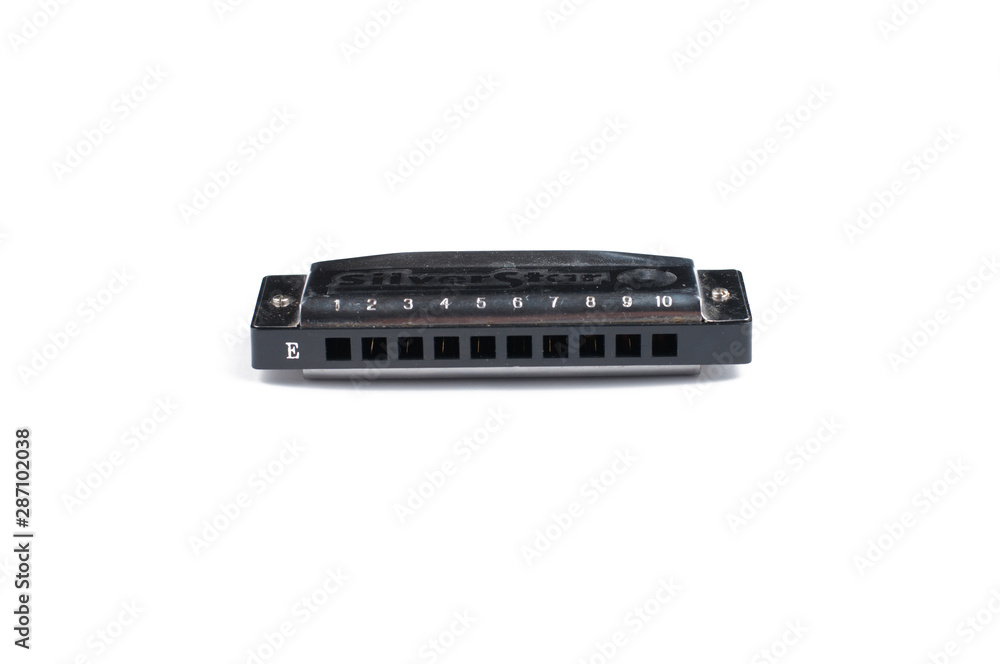 Mouth organ isolated on white background.Harmonica.Copy space Mouth organ isolated on white background.Harmonica.Copy space