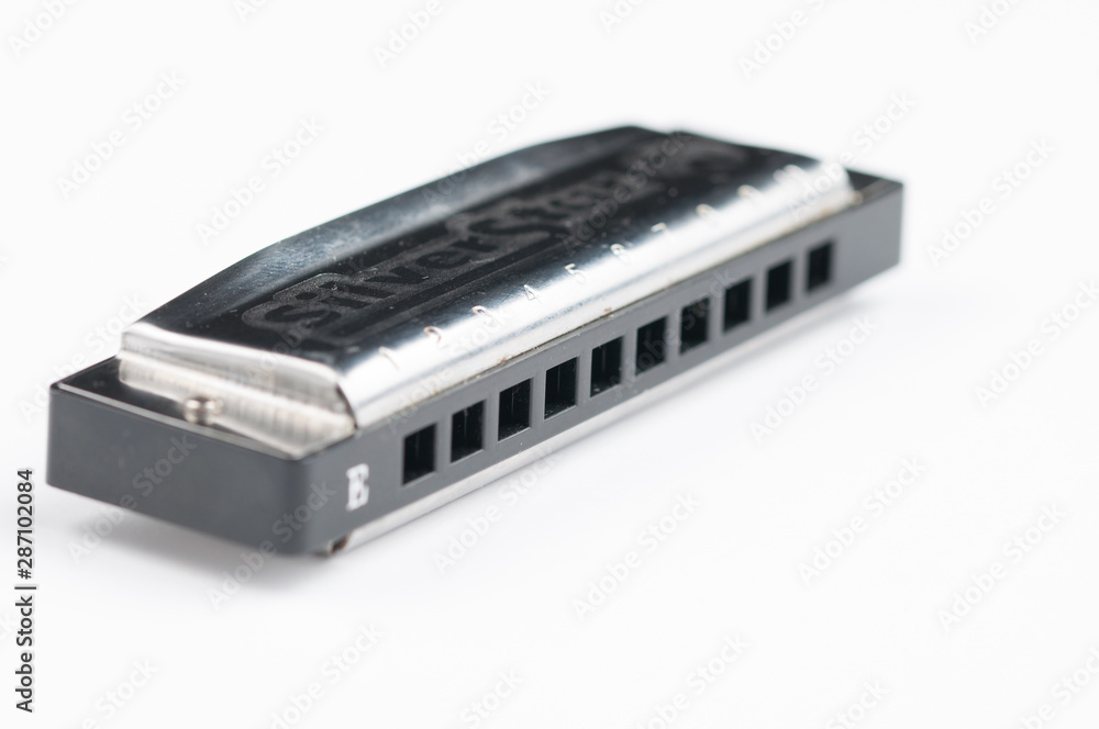 Mouth organ isolated on white background.Harmonica.Copy space Mouth organ isolated on white background.Harmonica.Copy space