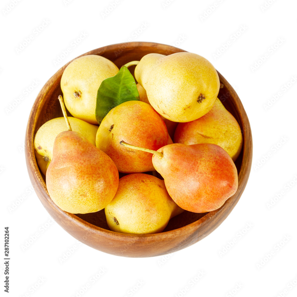 Pear in a bowl on white background. Organic pears top view. Pear in a bowl on white background. Organic pears top view.