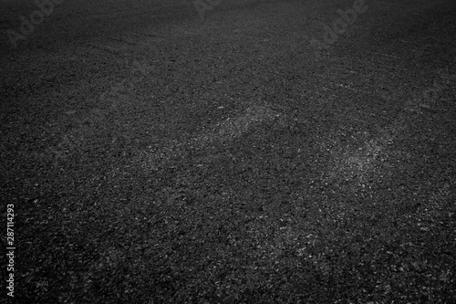 Fototapeta Naklejka Na Ścianę i Meble -  black asphalt texture. asphalt road. stone asphalt texture background black granite gravel.