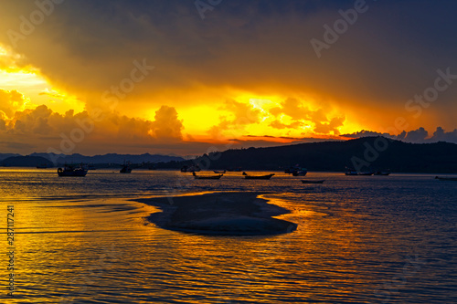 Sunset on beach with twilight at Baan Koh Teab photo