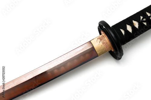 Colored folded steel blade with hamon (Clay tempered line for harden) Blade of Japanese sword  (Chinese made) on white background photo