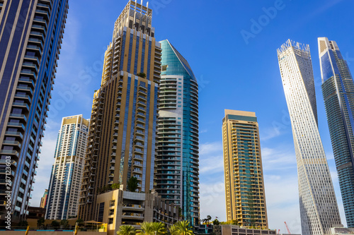 High-rise houses of modern futuristic design of Dubai Marina district.