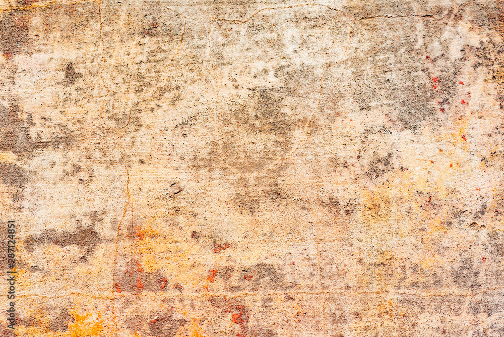 Obraz premium Texture of a concrete wall with cracks and scratches which can be used as a background