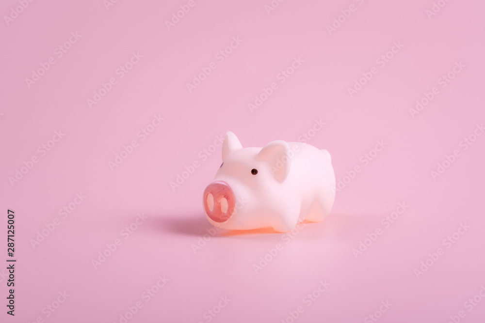 Cute little pink pig decoration on pink background