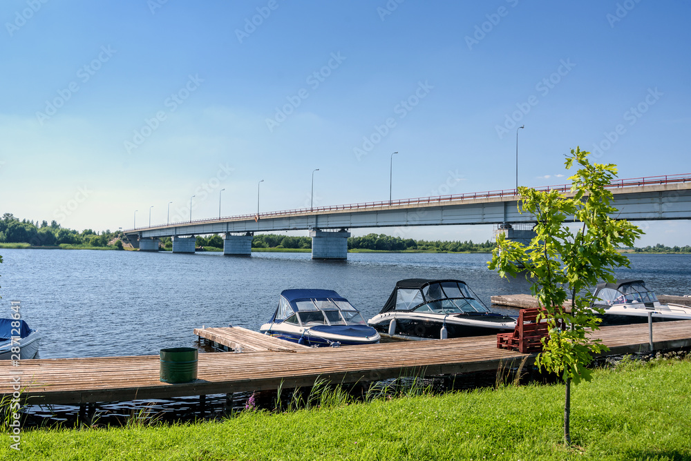 Fototapeta premium The small motorboat at pier