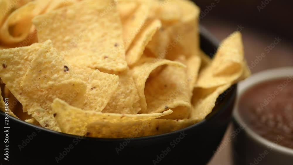 Bowl of corn tortilla chips and salsa Bowl of corn tortilla chips and salsa