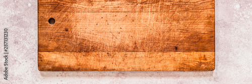 Old Chopping Board on Pink Background