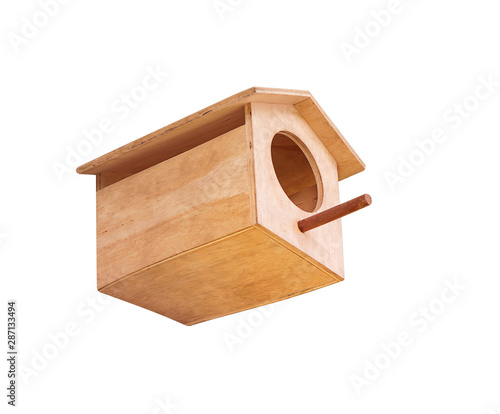 Old wooden bird house isolated on white background with clipping path photo