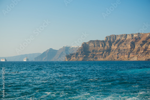  Picturesque view of view on a Santorini island and mountains. Vacations time