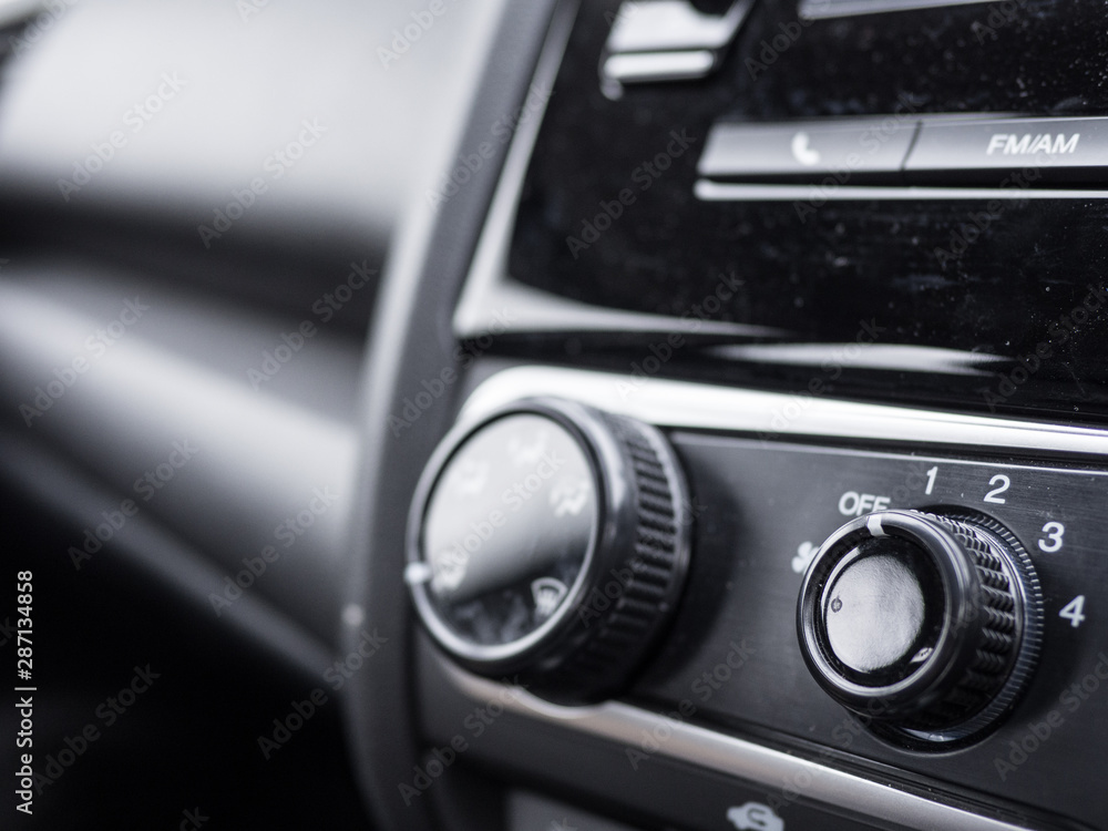 knob on car's console (selective focus)