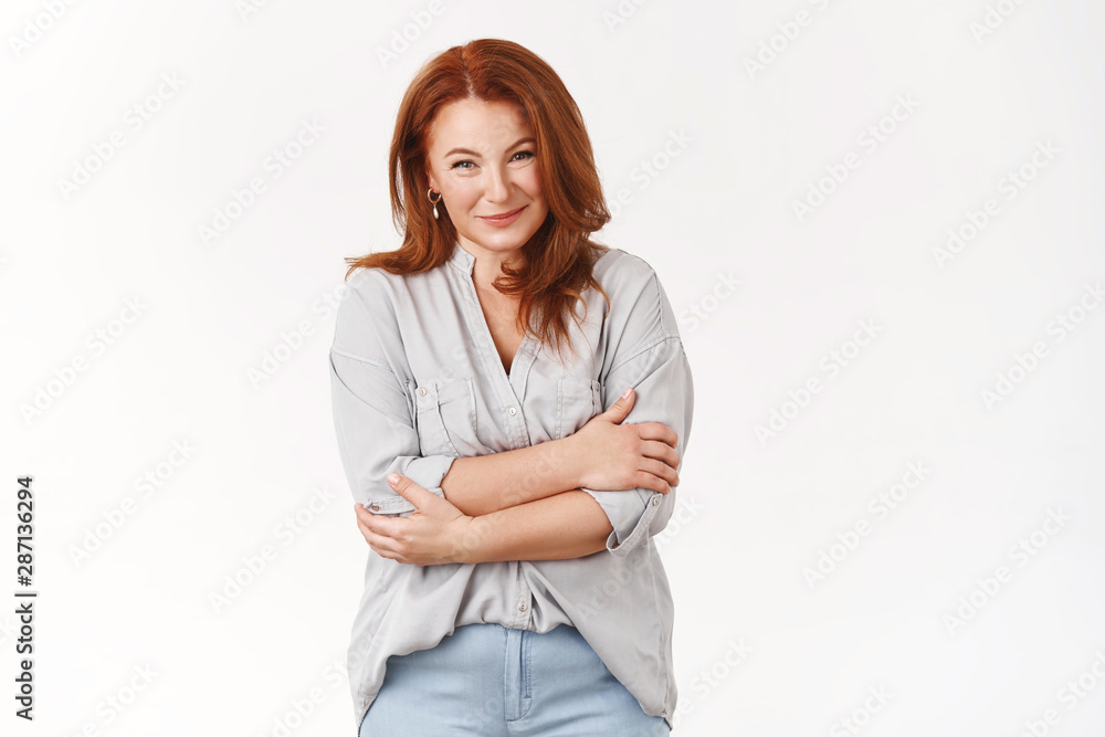 Glad charming redhead middle-aged mother look caring lovely grown-up son cross arms chest smiling delighted happily enjoying watching family gathering, standing positive mood white background Glad charming redhead middle-aged mother look caring lovely grown-up son cross arms chest smiling delighted happily enjoying watching family gathering, standing positive mood white background