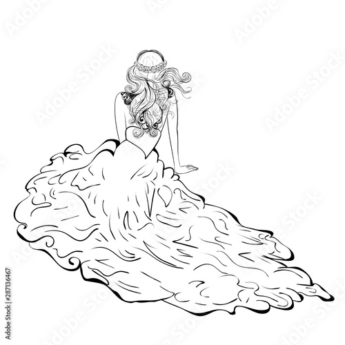 Bride sit in fluffy dress