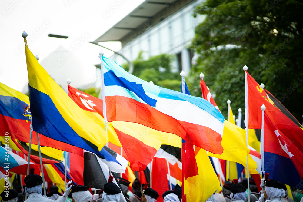 Naklejka premium Putrajaya, Malaysia -31 ST August 2019 ; Youth celebrating during 62 Malaysia Independence Day Parade On August 31,2019 in Dataran Putrajaya.