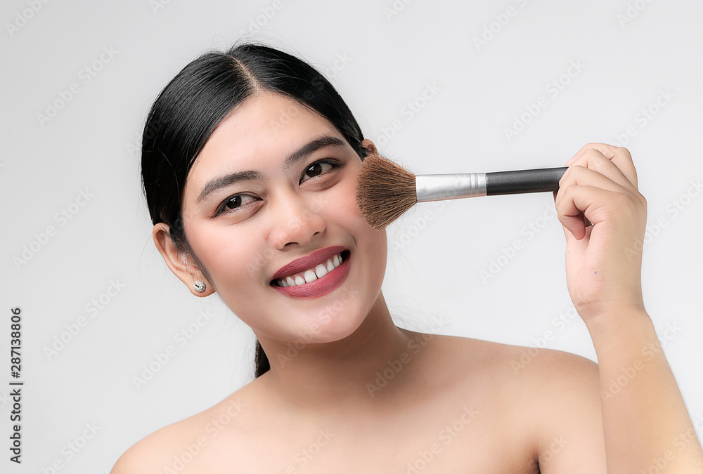 Beautiful Young asian Woman with Clean Fresh Skin look. Girl beauty face care. Facial treatment. Cosmetology, beauty and spa Beautiful Young asian Woman with Clean Fresh Skin look. Girl beauty face care. Facial treatment. Cosmetology, beauty and spa