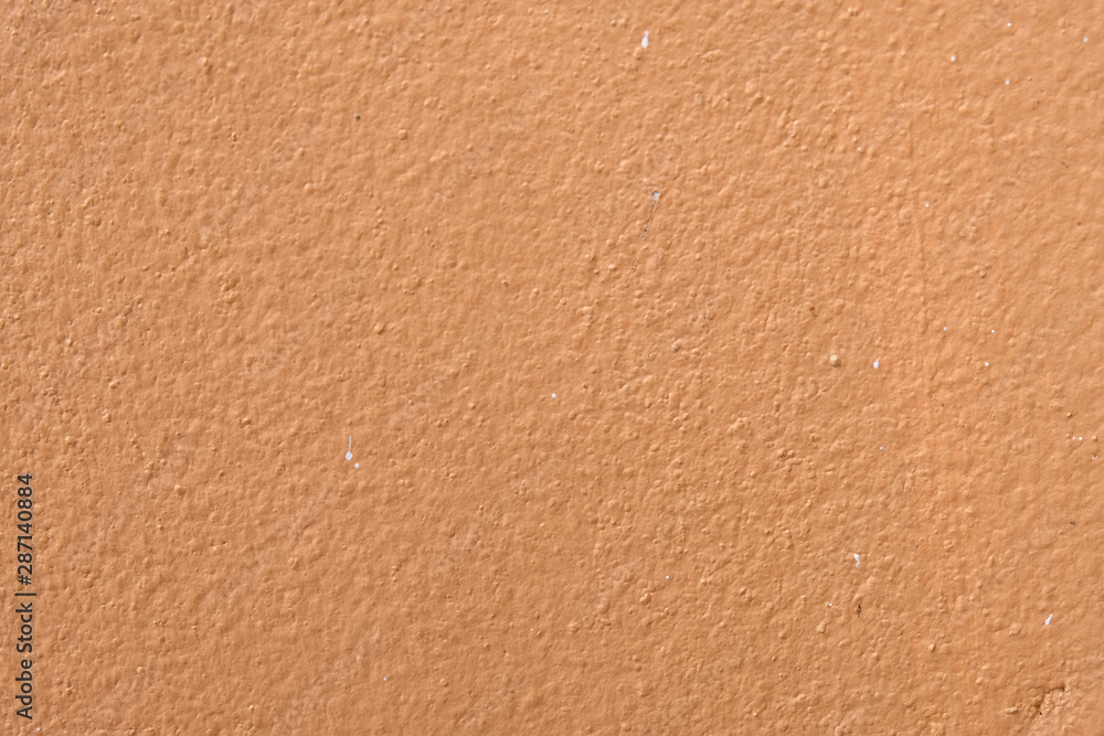 Fototapeta premium Brown cement wall background close up