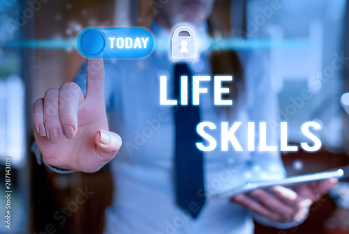 Writing note showing Life Skills. Business concept for skill that is necessary for full participation in everyday life Modern technology Lady front presenting hands blue glow copy space