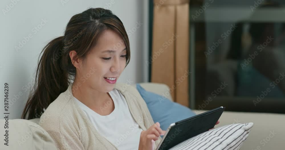 Woman use of tablet computer Woman use of tablet computer