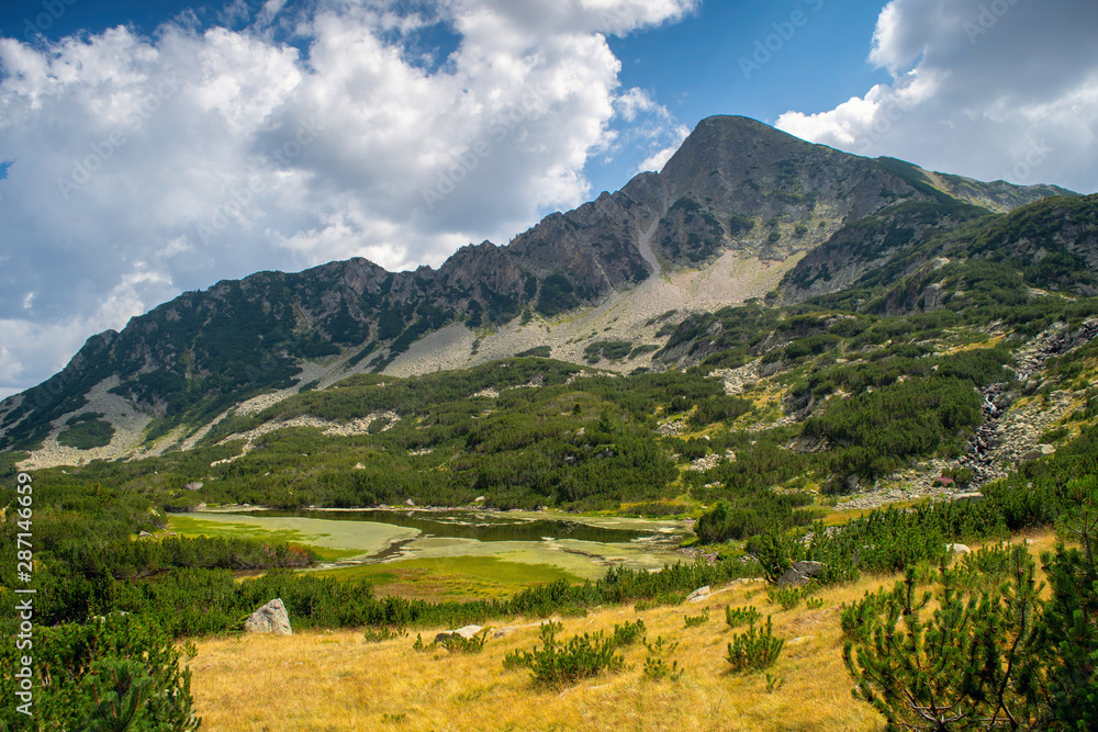Path between Bezbog lake and hut and the Popovo lake in Pirin national park, near Bansko, Bulgaria Path between Bezbog lake and hut and the Popovo lake in Pirin national park, near Bansko, Bulgaria